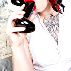 First pic of Tattooed goth lady Taurus poses naked with plush teddy and fucks herself with black dildo