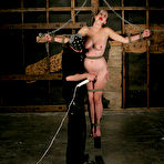 Fourth pic of Bound naked slave girl Xandra Nichole takes a punishment obediently in a dungeon