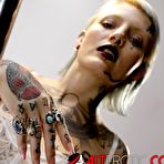Second pic of River Dawn Ink Stripper Pole Photoshoot