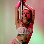 Third pic of River Dawn Ink Stripper Pole Photoshoot