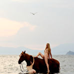 First pic of Naked Slender Lesbian Friends Dariya A And Lera B Ride The Horse Naked Together At The Seaside / DefineBabe.com