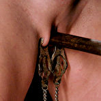 Third pic of Short haired bound slave blonde Vendetta gets her shaved snatch tortured