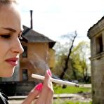 Third pic of Russian Smokers | Non smoker Masha is smoking two all white 120mm cigarettes outside