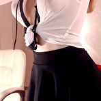 Second pic of Petite school uniform stocking babe webcam tits teasing - AmateurPorn