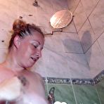 Third pic of Busty MILF having fun in the shower - AmateurPorn
