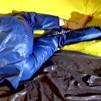 Second pic of ShinyNylonArts Rain Bound | Get 2 Videos with Lucy bound and gagged in her shiny nylon Rainwear from our Archives