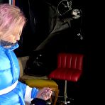 Third pic of Shinynylonartsbound | Sexy Pia being tied and gagged with ropes and a cloth gag on a hairdressers chair wearing a sexy blue shiny nylon rainpants and a lightblue downjacket (Video)