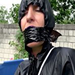 Second pic of ShinyNylonArts Rain Bound | Watch Sandra enjoying Bondage  in her shiny nylon  Rainwear outside