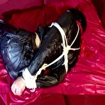 Second pic of ShinyNylonArts Rain Bound | Get 2 updates with Lucy bound and gagged in her shiny nylon Rainwear from our Archives