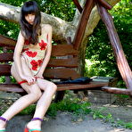 Second pic of NuDolls Marina in Doll on bench