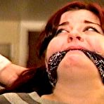 Third pic of tied-and-gagged.com | 23 YR OLD REAL ESTATE BROKER IS WRAP BONDAGE TAPE GAGGED, MOUTH STUFFED, CLEAVE GAGGED, HANDGAGGED, BANDANNA GAGGED, GAGS ON A SPONGE, GAG-TALKING, NYLON COVERED BARE FEET AND TIED TO A CHAIR