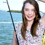 Second pic of Naughty Mag - Elena Koshka - Babyfaced Elena goes fishing on a dock while dreaming of a cock!