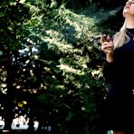 Fourth pic of Russian Smokers | Blond lady is smoking white cigarette outdoors