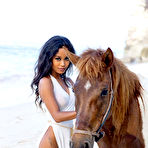 Third pic of Putri Cinta in a Sheer Dress at the Beach