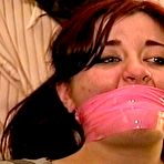 Third pic of tied-and-gagged.com | D75-07: 23 YR OLD REAL ESTATE BROKER IS MOUTH STUFFED, CLEAVE GAGGED, GAG TALKS, HANDGAGGED, WRAP TAPE BONDAGE TAPE GAGGED, BAREFOOT AND TIED TO A CHAIR WITH ROPE 5:17