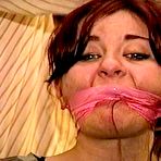 Fourth pic of tied-and-gagged.com | D75-07: 23 YR OLD REAL ESTATE BROKER IS MOUTH STUFFED, CLEAVE GAGGED, GAG TALKS, HANDGAGGED, WRAP TAPE BONDAGE TAPE GAGGED, BAREFOOT AND TIED TO A CHAIR WITH ROPE 5:17