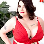 First pic of Tattooed BBW Nagini peels off a crimson dress while making her nude debut on a couch - Nude Women Pics