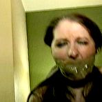 Third pic of tied-and-gagged.com | 26 YEAR OLD ACTRESS GETS HER MOUTH STUFFED WITH PANTIES, WRAP TAPE GAGGED, HANDGAGGED, BAREFOOT, TOE-TIED, F0RCED HIGH HEEL SMELLING, GAG TALKS AND TIED TO A CHAIR WITH ROPE  (D74-16)