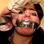 First pic of tied-and-gagged.com | 23 YR OLD REAL ESTATE BROKER IS MOUTH STUFFED WITH A SPONGE, WRAP TAPE GAGGED, GAG TALKING, RAG STUFFED IN MOUTH AND TIGHTLY HANDGAGGED  (D74-15)