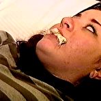 Third pic of tied-and-gagged.com | 23 YR OLD REAL ESTATE BROKER IS MOUTH STUFFED WITH A SPONGE, WRAP TAPE GAGGED, GAG TALKING, RAG STUFFED IN MOUTH AND TIGHTLY HANDGAGGED  (D74-15)