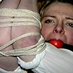 Fourth pic of tied-and-gagged.com | 30 Yr OLD BBW SINGLE MOM IS TAPE GAGGED, BAREFOOT, BALL-GAGGED, TIT TIED, NIPPLE PINCHED AND TIED TO A COAT RACK (D73-17)