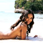 Fourth pic of Putri Cinta drops her white fishnet dress at the beach showcasing big boobs