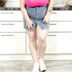 First pic of Overweight solo girl Mary Brown unleashes her massive tits in a kitchen