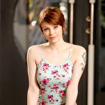 First pic of Short haired redhead in pink panties unveiling full all natural breasts