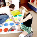 First pic of Foxy teen enjoys a twister play turning into passionate pussy pounding