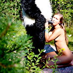 Fourth pic of Young girl Penny gets banged by a Panda on a boulder near the woods