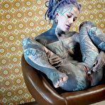 Second pic of Tattooed girl Anuskatzz pleasures her pussy with a sex machine in her ass