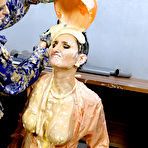 Fourth pic of Lesbian women cover each other in messy foodstuffs while fully dressed