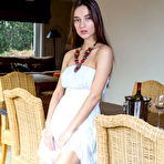 First pic of Gorgeous teen Gloria Sol removes a white dress to pose nude in a dining room