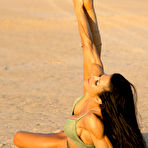 Fourth pic of Bodybuilder Janet Lee West models on railway tracks and a dry lake bed too