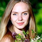 First pic of Sweet teen girl puts down her flowers and proceeds to model in the nude