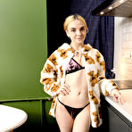 First pic of Beautiful blonde teen Lina Sun eats a banana while getting naked