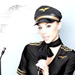 First pic of Shapely stewardess with big tits Chanel Preston strips off sexy uniform
