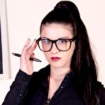 First pic of Nerdy chick Bianca frees her hose covered feet from heels at her desk