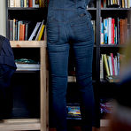 Third pic of Skinny amateur Gretchen dresses herself among library stacks
