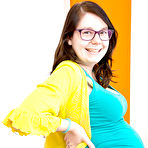 First pic of Glasses wearing amateur pregnant solo girl revealing baby bump and breasts