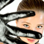 First pic of Collared teen sports a shine while modeling naked in black gloves and hosiery