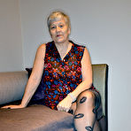 First pic of Older granny Savana pulls down hot pantyhose to rub clit with saggy tits out