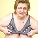 Third pic of Fat granny removes her bra to let her massive saggy tits hang & pinch nipples