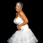 First pic of Brazen plump granny Savana flashes panty upskirt in tutu & sparkly high heels