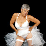 Third pic of Brazen plump granny Savana flashes panty upskirt in tutu & sparkly high heels