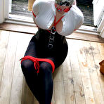 Second pic of Blonde chick is left tied up, blindfolded and gagged inside front door