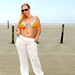 First pic of Overweight blonde Dee Siren removes her bikini to go nude on a beach