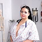 First pic of Fat brunette Aurora Rainbow gets naked at a medical clinic in dirty socks