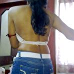 Second pic of Indian MILF displays her natural tits while wearing blue jeans