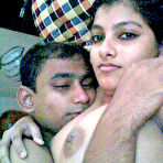 Third pic of Busty Indian woman joins her man friend for foreplay on bed